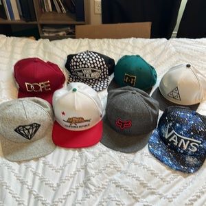 8 adjustable hats.  Skater brands.